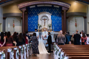 Littleton wedding photographer bride and groom Catholic ceremony Colorado photography flowers Mass married marriage church ceremony Spanish family