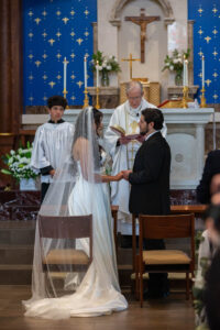 Littleton wedding photographer bride and groom Catholic ceremony Colorado photography flowers Mass married marriage church ceremony Spanish family