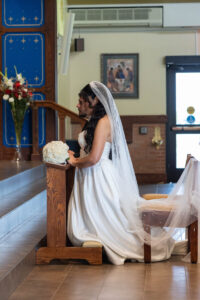 Littleton wedding photographer bride and groom Catholic ceremony Colorado photography flowers Mass married marriage church ceremony Spanish family
