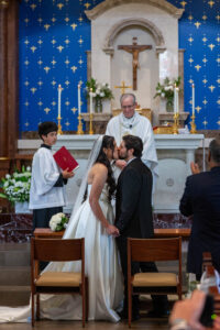 Littleton wedding photographer bride and groom Catholic ceremony Colorado photography flowers Mass married marriage church ceremony Spanish family