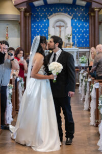 Littleton wedding photographer bride and groom Catholic ceremony Colorado photography flowers Mass married marriage church ceremony Spanish family