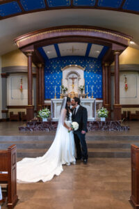 Littleton wedding photographer bride and groom Catholic ceremony Colorado photography flowers Mass married marriage church ceremony Spanish family
