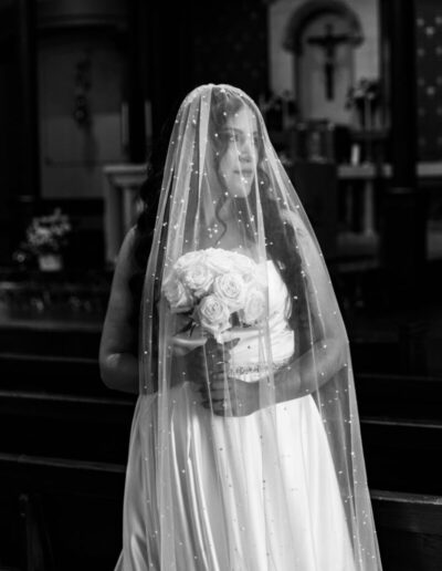 Littleton wedding photographer bride and groom Catholic ceremony Colorado photography flowers Mass married marriage church ceremony Spanish family
