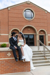 Littleton wedding photographer bride and groom Catholic ceremony Colorado photography flowers Mass married marriage church ceremony Spanish family