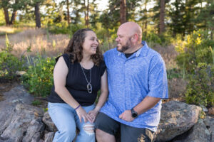 Littleton family photographer Mt. Falcon park Colorado sunset golden hour sisters photography mountain views mother father daughters wildflowers 