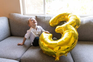 Littleton family and newborn baby photographer Colorado in home lifestyle photography boy parents son brothers