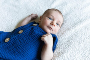 Littleton family and newborn baby photographer Colorado in home lifestyle photography boy parents son brothers