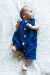 Littleton family and newborn baby photographer Colorado in home lifestyle photography boy parents son brothers