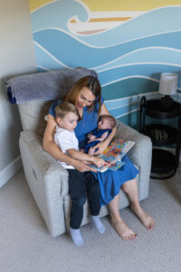 Littleton family and newborn baby photographer Colorado in home lifestyle photography boy parents son brothers nursery