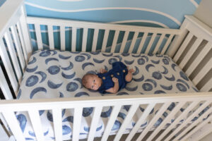 Littleton family and newborn baby photographer Colorado in home lifestyle photography boy parents son brothers