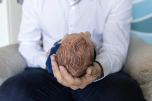 Littleton family and newborn baby photographer Colorado in home lifestyle photography boy parents son brothers
