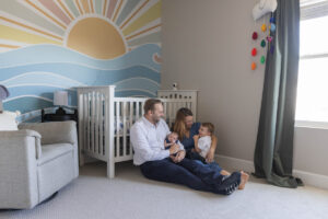 Littleton family and newborn baby photographer Colorado in home lifestyle photography boy parents son brothers