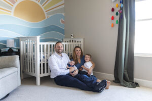 Littleton family and newborn baby photographer Colorado in home lifestyle photography boy parents son brothers