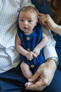 Littleton family and newborn baby photographer Colorado in home lifestyle photography boy parents son brothers