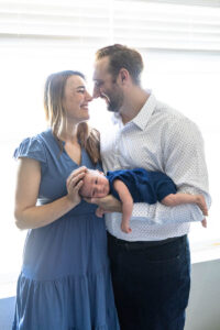 Littleton family and newborn baby photographer Colorado in home lifestyle photography boy parents son brothers