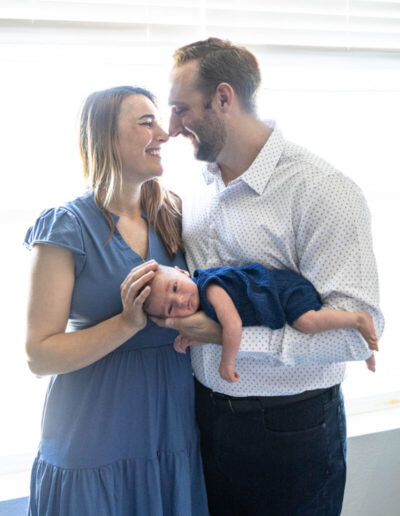 Littleton family and newborn baby photographer Colorado in home lifestyle photography boy parents son