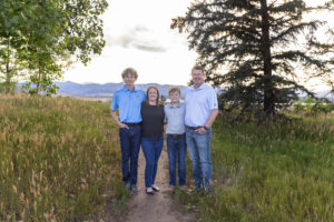 Littleton family photographer Fly'N B park Colorado Highlands Ranch photography sunset brothers mother father sons boys high school senior teenagers