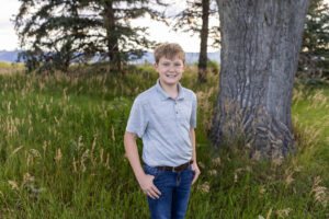 Littleton family photographer Fly'N B park Colorado Highlands Ranch photography sunset brothers mother father sons boys high school senior teenagers