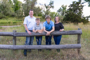 Littleton family photographer Fly'N B park Colorado Highlands Ranch photography sunset brothers mother father sons boys high school senior teenagers