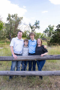 Littleton family photographer Fly'N B park Colorado Highlands Ranch photography sunset brothers mother father sons boys high school senior teenagers