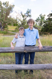 Littleton family photographer Fly'N B park Colorado Highlands Ranch photography sunset brothers mother father sons boys high school senior teenagers