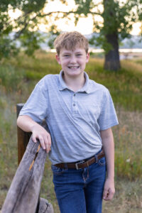 Littleton family photographer Fly'N B park Colorado Highlands Ranch photography sunset brothers mother father sons boys high school senior teenagers