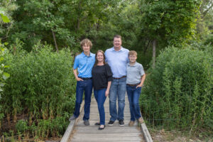 Littleton family photographer Fly'N B park Colorado Highlands Ranch photography sunset brothers mother father sons boys high school senior teenagers