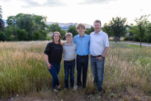 Littleton family photographer Fly'N B park Colorado Highlands Ranch photography sunset brothers mother father sons boys high school senior foothills teenagers
