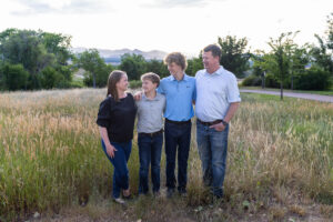 Littleton family photographer Fly'N B park Colorado Highlands Ranch photography sunset brothers mother father sons boys high school senior teenagers