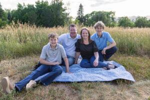 Littleton family photographer Fly'N B park Colorado Highlands Ranch photography sunset brothers mother father sons boys high school senior teenagers
