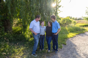 Littleton family photographer Fly'N B park Colorado Highlands Ranch photography sunset brothers mother father sons boys high school senior teenagers