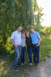Littleton family photographer Fly'N B park Colorado Highlands Ranch photography sunset brothers mother father sons boys high school senior teenagers