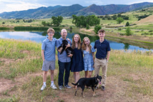 Littleton high school senior photographer South Valley Colorado family photo session portrait Navy siblings red rocks dogs photography sunset cross country track