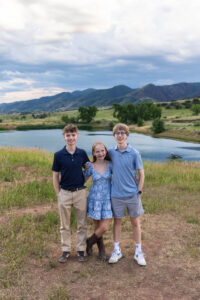 Littleton high school senior photographer South Valley Colorado family photo session portrait Navy siblings red rocks dogs photography sunset cross country track