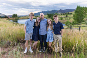 Littleton high school senior photographer South Valley Colorado family photo session portrait Navy siblings red rocks dogs photography sunset cross country track