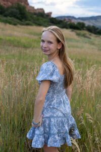 Littleton high school senior photographer South Valley Colorado family photo session portrait Navy siblings red rocks dogs photography sunset cross country track