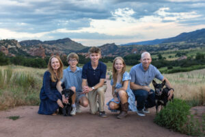 Littleton high school senior photographer South Valley Colorado family photo session portrait Navy siblings red rocks dogs photography sunset cross country track