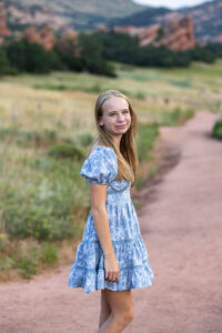 Littleton high school senior photographer South Valley Colorado family photo session portrait Navy siblings red rocks dogs photography sunset cross country track