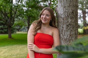 Littleton high school senior photographer Colorado Dakota Ridge class of 2026 nursing student photography South Valley red rocks sunset Writer's Vista park flowers family siblings mother father brother sister daughter son