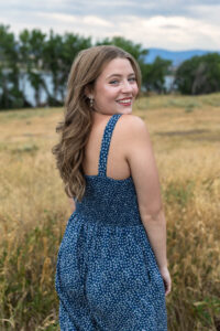 Littleton high school senior photographer Colorado Dakota Ridge class of 2026 nursing student photography South Valley red rocks sunset Writer's Vista park flowers family siblings mother father brother sister daughter son