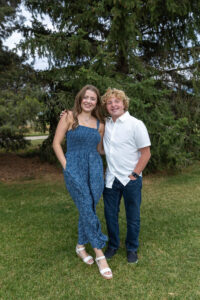 Littleton high school senior photographer Colorado Dakota Ridge class of 2026 nursing student photography South Valley red rocks sunset Writer's Vista park flowers family siblings mother father brother sister daughter son