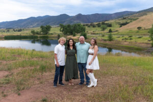 Littleton high school senior photographer Colorado Dakota Ridge class of 2026 nursing student photography South Valley red rocks sunset Writer's Vista park flowers family siblings mother father brother sister daughter son