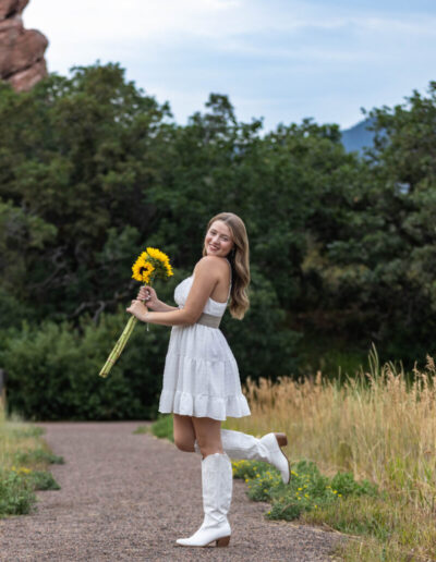 Littleton high school senior photographer Colorado Dakota Ridge class of 2026 nursing student photography South Valley red rocks sunset Writer's Vista park flowers family siblings mother father brother sister daughter son