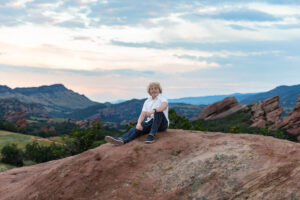 Littleton high school senior photographer Colorado Dakota Ridge class of 2026 nursing student photography South Valley red rocks sunset Writer's Vista park flowers family siblings mother father brother sister daughter son