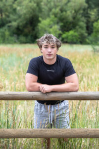 Littleton high school senior photographer Colorado Lair o' the Bear park South Valley photography sunset foothills football player Chatfield student class of 2026 teen teenager boy
