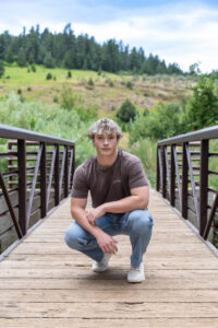 Littleton high school senior photographer Colorado Lair o' the Bear park South Valley photography sunset foothills football player Chatfield student class of 2026 teen teenager boy