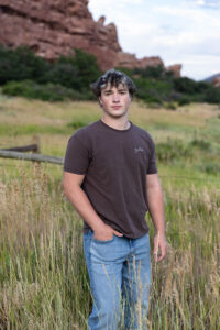 Littleton high school senior photographer Colorado Lair o' the Bear park South Valley photography sunset foothills football player Chatfield student class of 2026 teen teenager boy