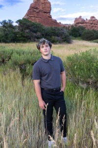 Littleton high school senior photographer Colorado Lair o' the Bear park South Valley photography sunset foothills football player Chatfield student class of 2026 teen teenager boy