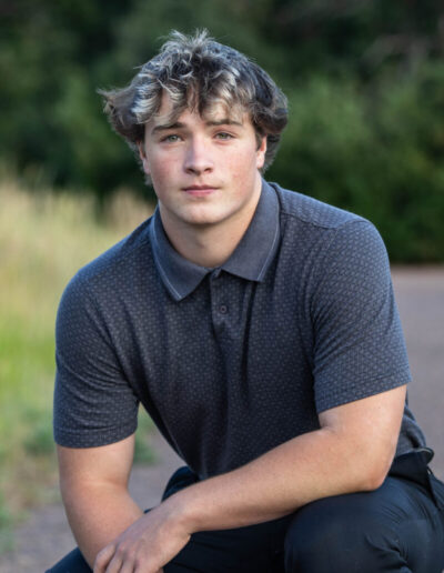 Littleton high school senior photographer Colorado Lair o' the Bear park South Valley photography sunset foothills football player Chatfield student class of 2026 teen teenager boy