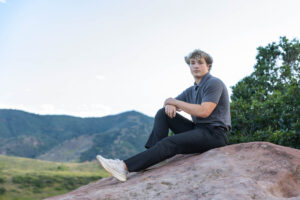 Littleton high school senior photographer Colorado Lair o' the Bear park South Valley photography sunset foothills football player Chatfield student class of 2026 teen teenager boy